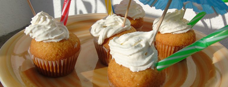 Pina Colada Cupcakes with Rum Buttercream Frosting (20-Minute Recipe) Pina Colada Cupcakes with Rum Buttercream Frosting (20-Minute Recipe)